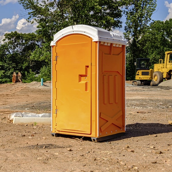 what is the cost difference between standard and deluxe portable restroom rentals in Higbee MO